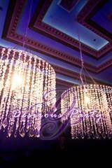 Chandeliers and upscale drop lighting fixtures hand everywhere at the new Ultra Lounge at the Ritz. 