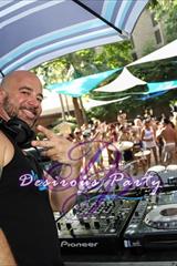 Mikedrop in the dj booth at the Disavowed Pool Party at Purgatory 2021 