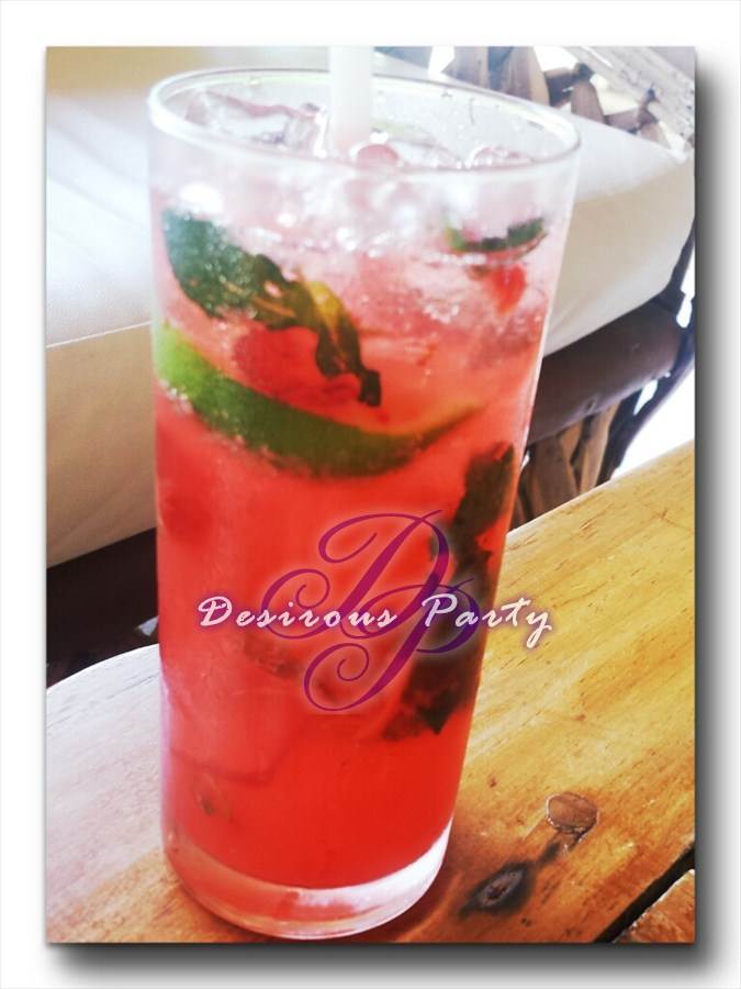 Fresh strawberry mojitos made for you at the bar. 
