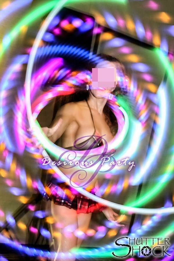 Glowing hoola hoops and a naughty school girl makes for a perfect photo. 