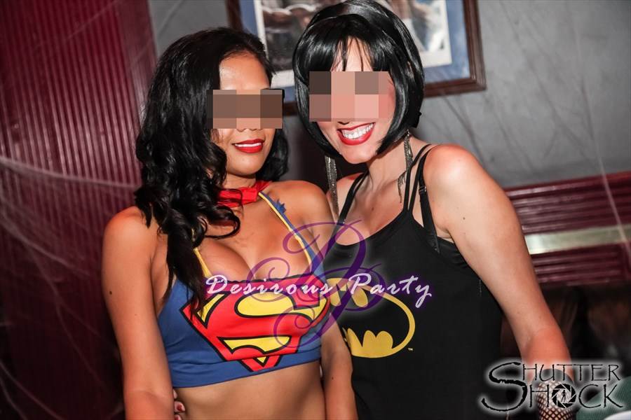 Supergirl and batwoman at this years halloween erotica ball.