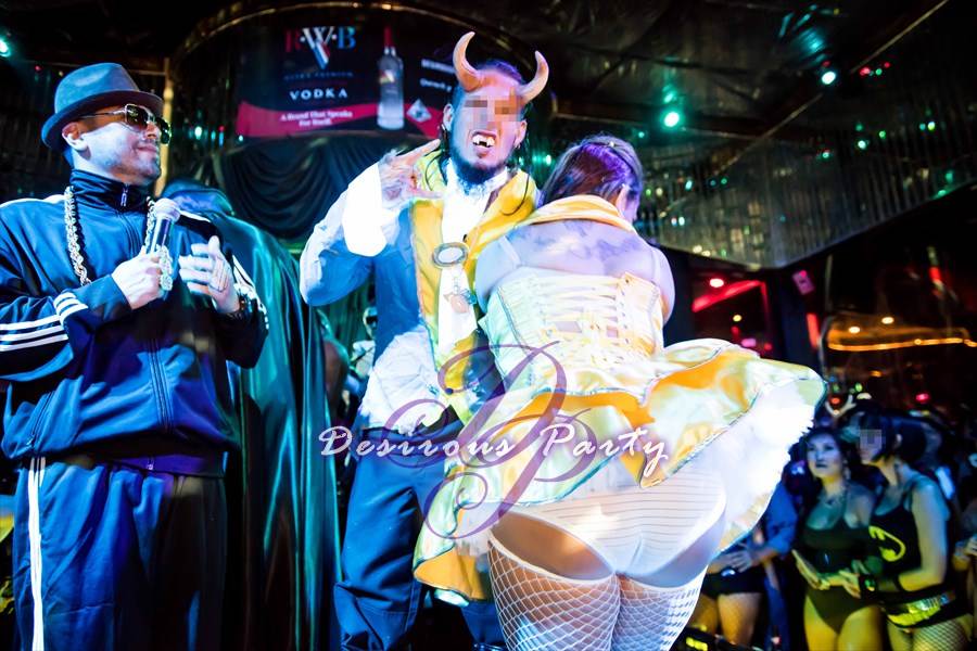 Beauty and the beast couples costume at the Halloween Erotica Ball in Houston. 