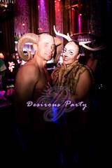 Awesome couples costume of a deer and ram at the Halloween Erotica Ball in Houston. 