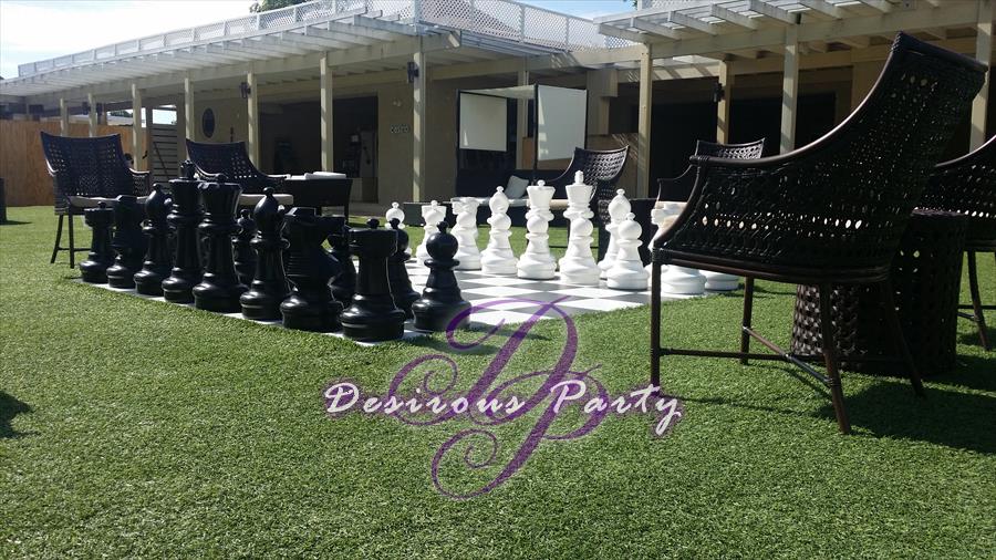 A game of lawn chess in the court yard at Hedonism II. 