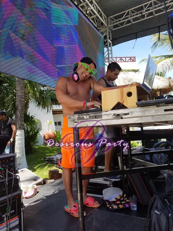 Dj Maluco behind the music for the Music Fest foam pool party. 