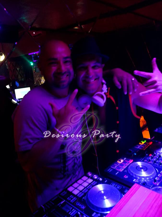 Dj Omaar and Maluco behind the decks together at the disco at Desire Pearl. 