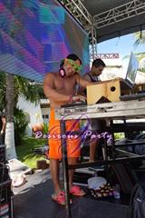 Dj Maluco behind the music for the Music Fest foam pool party. 