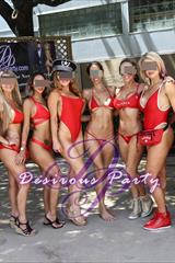 Gorgeous girls in baywatch red swimsuit theme at Purgatory 2019 in Houston. 