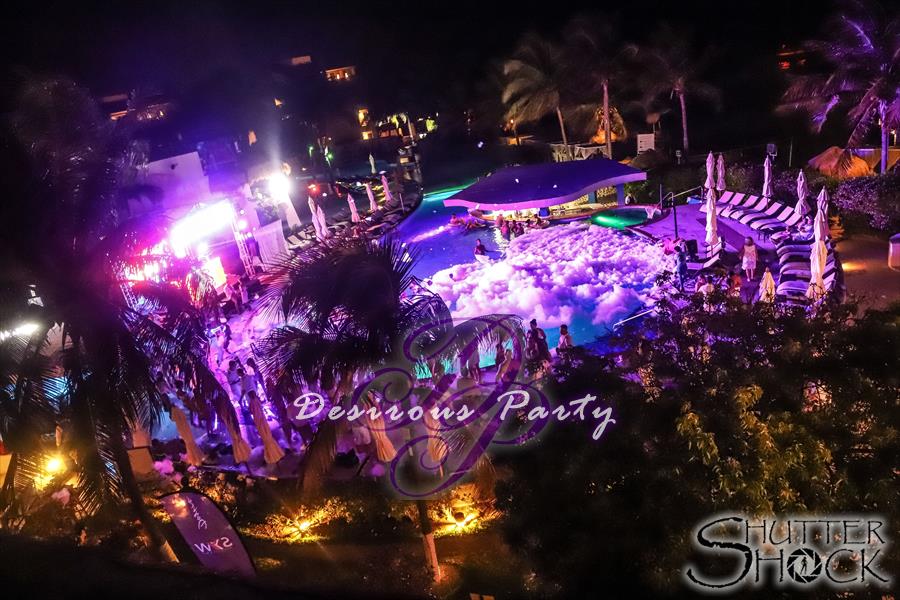 Overhead view of the night time foam pool party at Desire Pearl for dirty vibes music fest. 