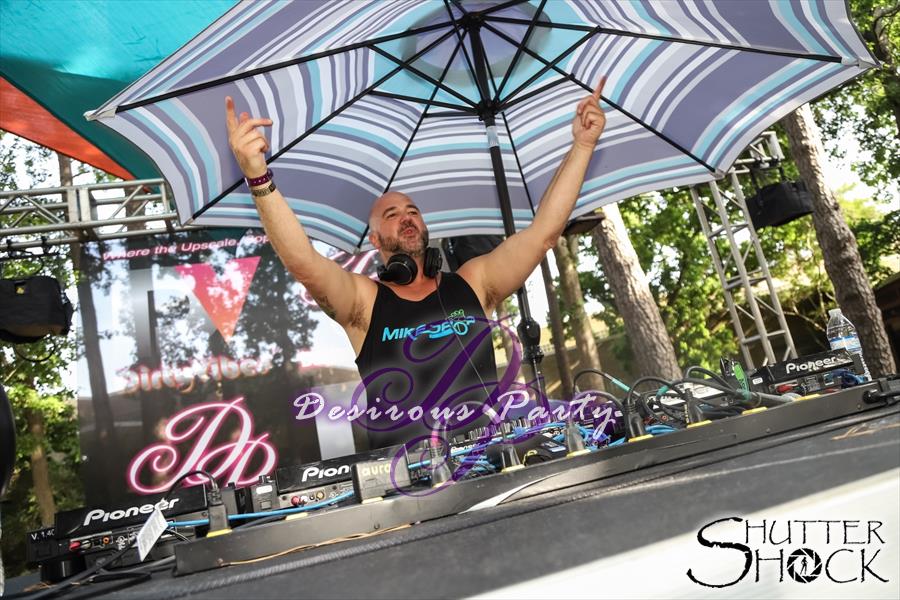 Mikedrop having a blast spinning to the masses at Purgatory 2021 pool deck