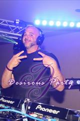 Dj Mikedrop behind the sound in the grand ballroom at Purgatory 2021